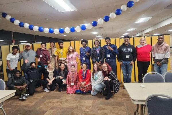 Members of the MEC posing during a celebration